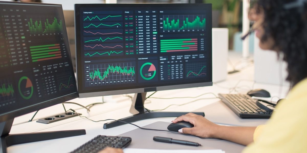 Analyst reviewing market data
