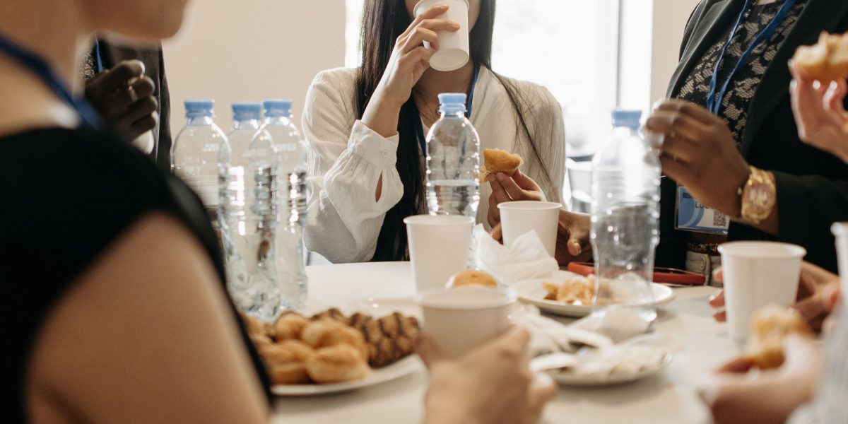 Diverse professionals connecting and exchanging ideas at a networking event.