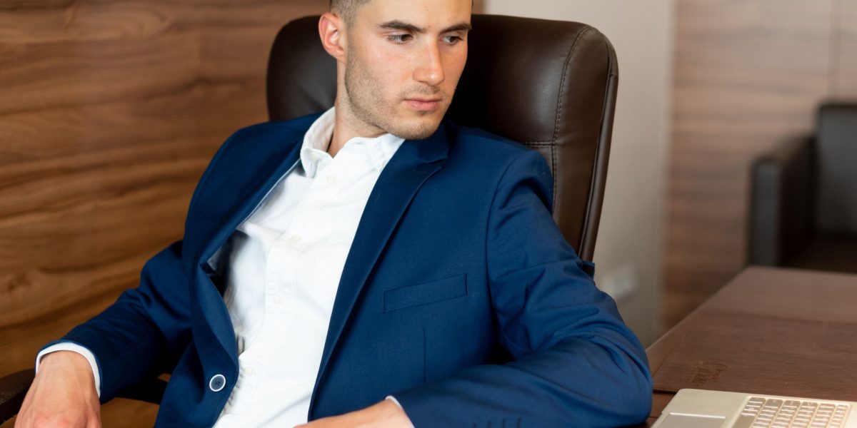 A confident executive in a professional setting, symbolizing the strong leadership within private equity firms.