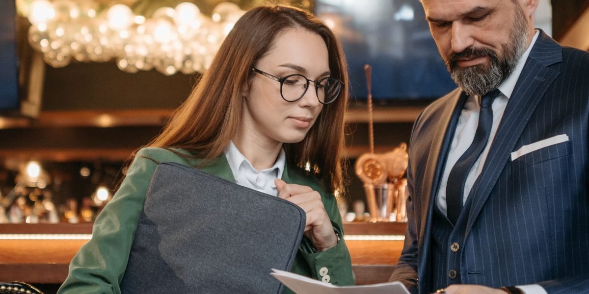 A mentor providing strategic guidance to a mentee, symbolizing the valuable support venture capitalists offer to startups.