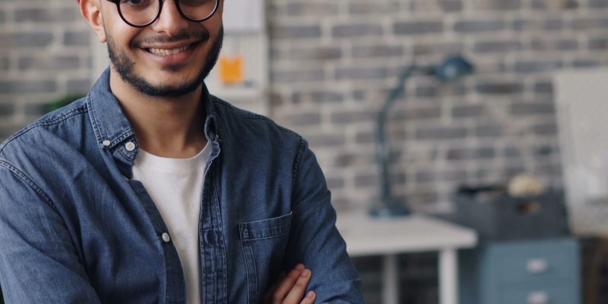 A confident startup founder, having successfully matched their company with the right investor for their stage and sector.