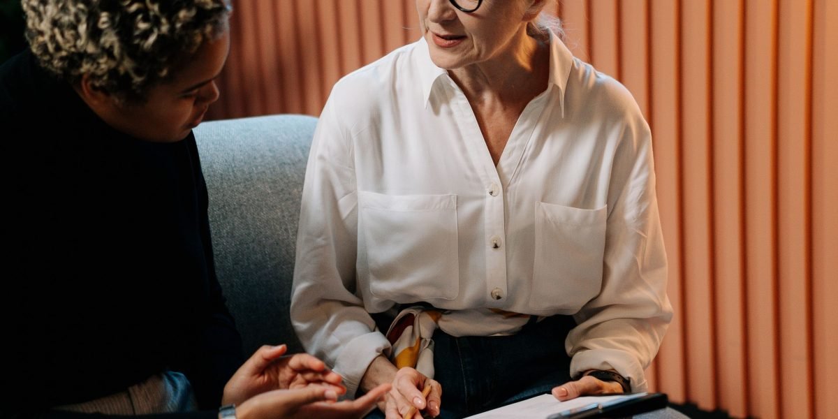 A founder receives guidance from an experienced mentor, navigating the complexities of business growth and fundraising.