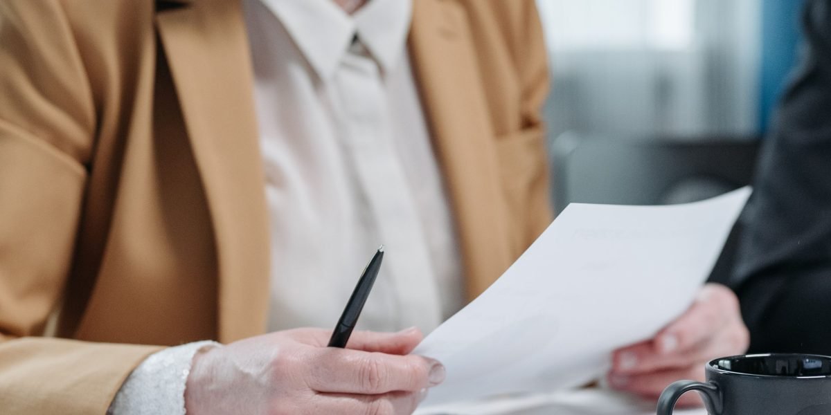 An entrepreneur carefully evaluates different program options, considering various factors to make an informed decision for their startup.