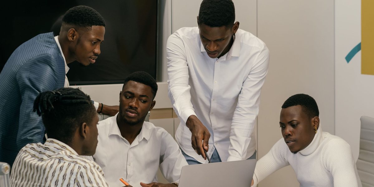 A diverse team collaborates actively, reflecting the ambitious and connected environment of top tech hubs.