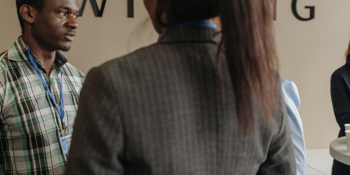 Individuals engaging in meaningful conversations and building professional connections at an event.