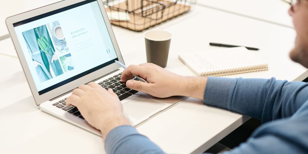 A founder meticulously researching potential investment firms to find the best strategic fit for their startup.