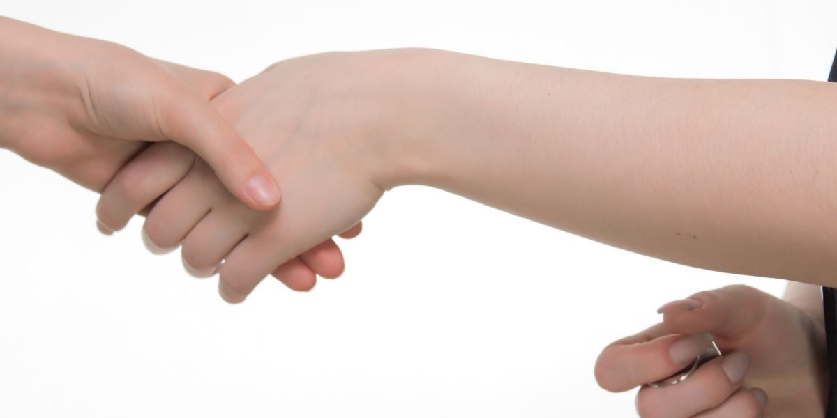 A handshake between two business partners, signifying the establishment of a lasting, trust-based relationship.