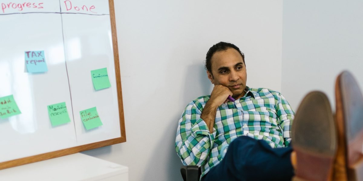 A founder contemplating strategic decisions amidst the complexities of securing capital investment.