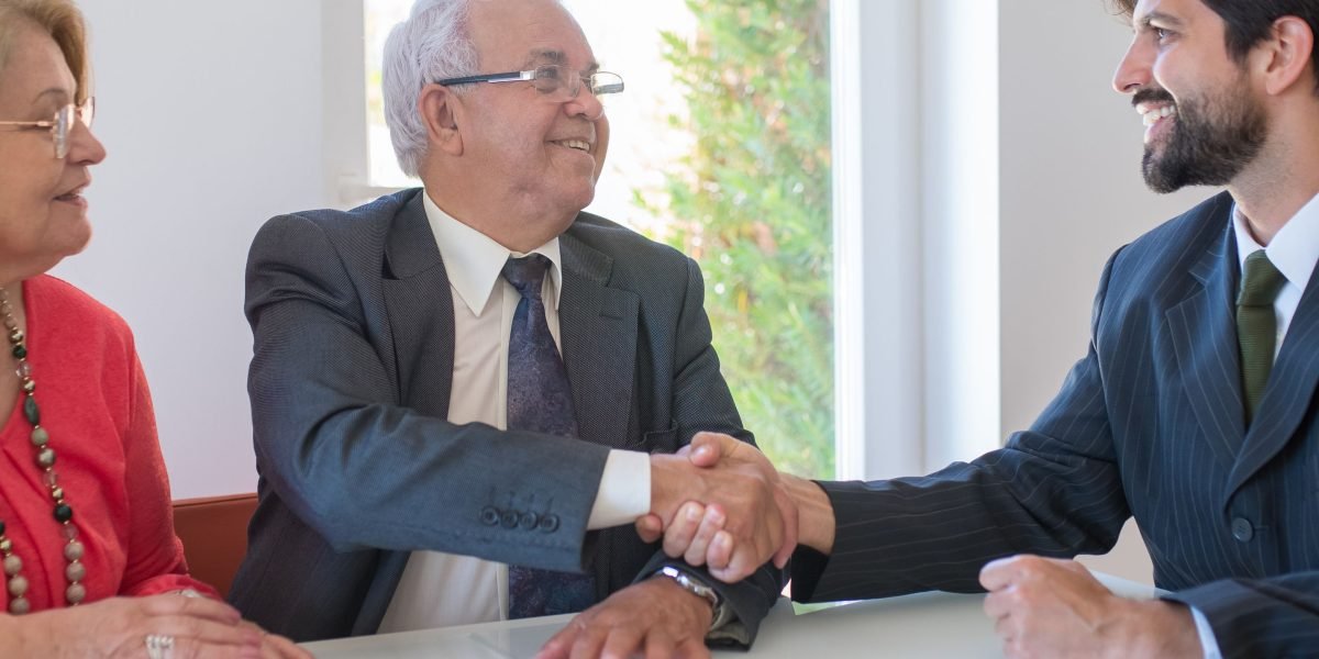 A handshake symbolizes the formation of a strong strategic capital partnership, built on mutual trust and shared goals.