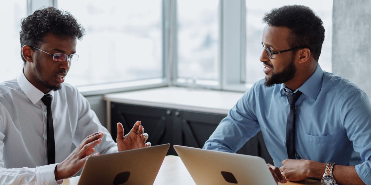 Professionals engage in a dynamic discussion about the implications of emerging technologies like AI and edge computing.
