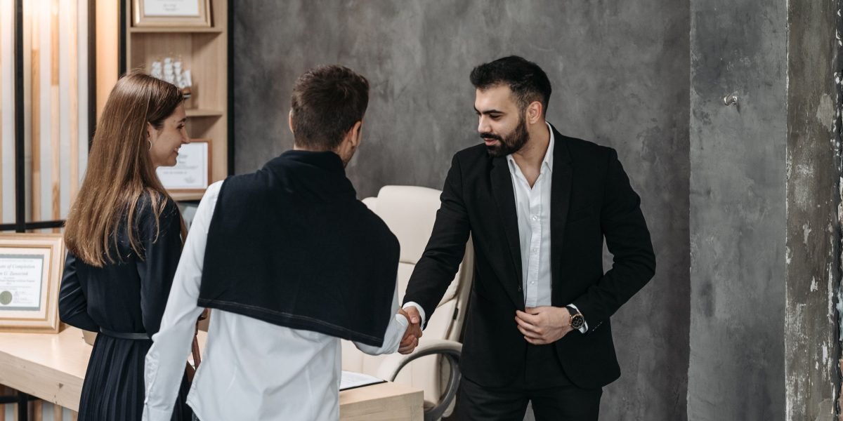 Founders engage in a discussion about financial terms and investment deals.