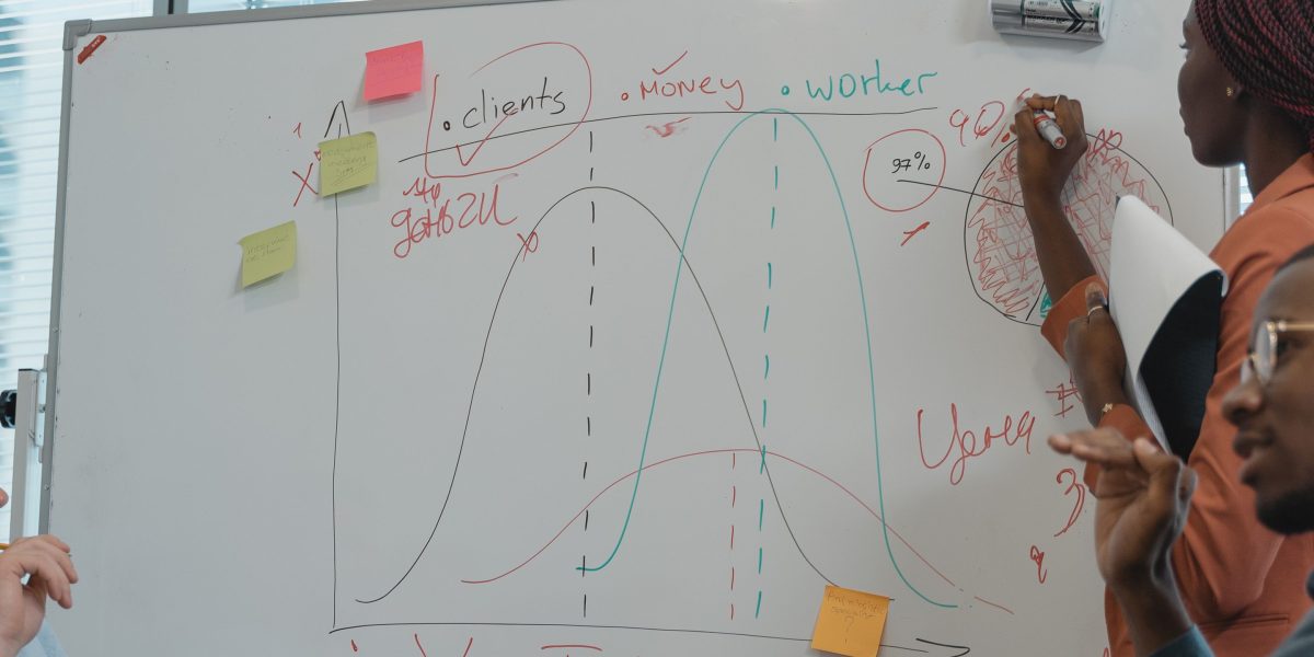 Professionals collaborate to strategize growth, reflecting the dynamic world of startups and investments.